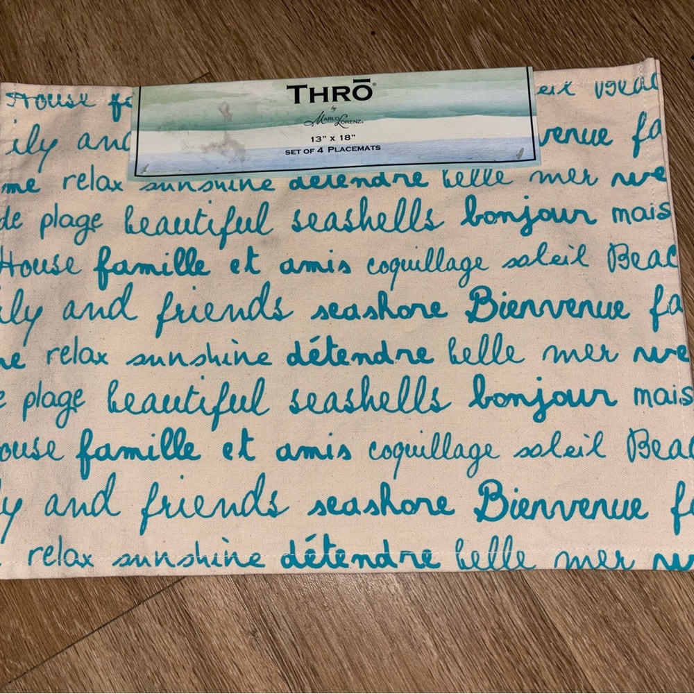 set of four placemats from the brand THRO beach theme